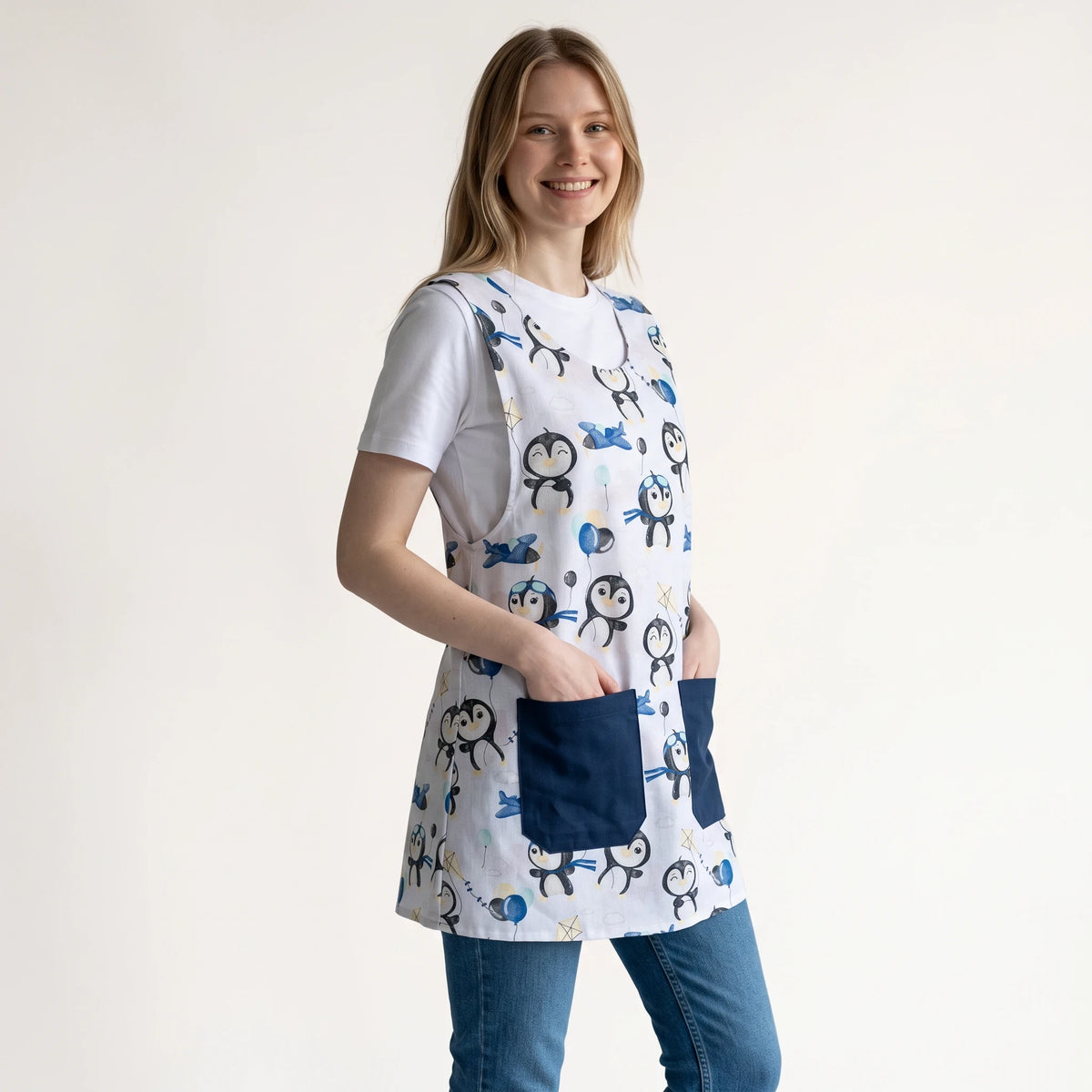 Bata de professora SuYa Shop com estampado de pinguins, sem mangas, com bolsos frontais azul-marinho