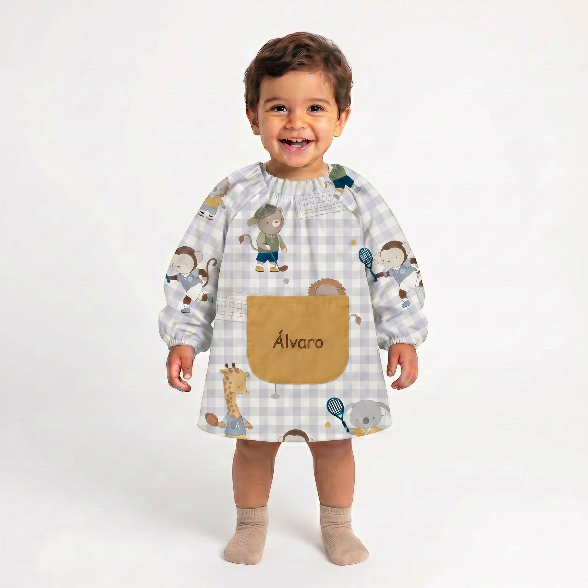 SuYa Shop personalized toddler school smock with animal print, elastic cuffs, and a beige pocket on white background.
