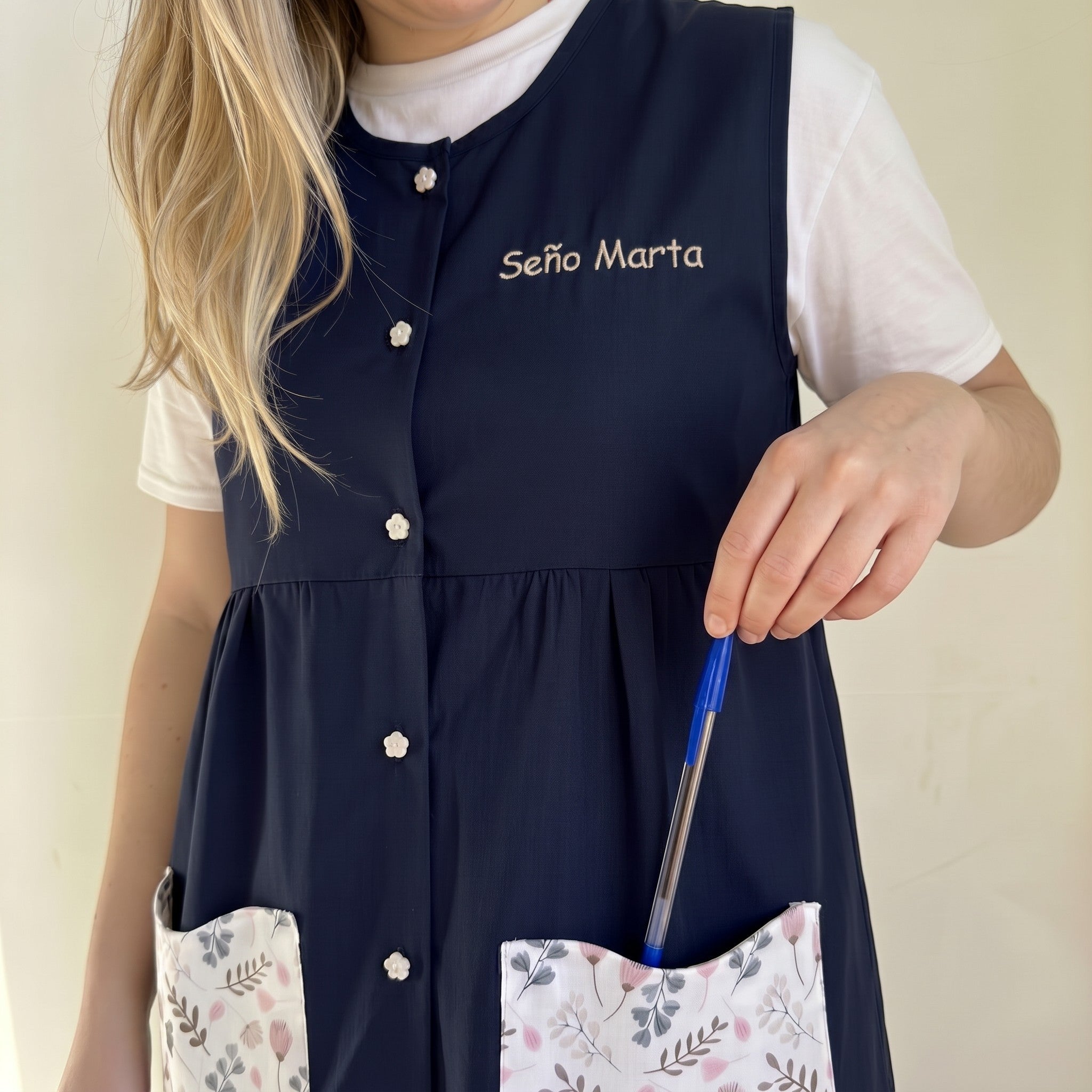 SuYa Shop navy blue sleeveless teacher smock with floral pockets and personalized embroidery on the chest
