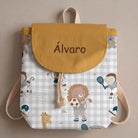 SuYa Shop personalized kids backpack with mustard flap, blue gingham print, and cute animal sports illustrations.