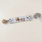 SuYa Shop personalized grey gingham pacifier clip featuring monkey tennis print and embroidered name Alvaro